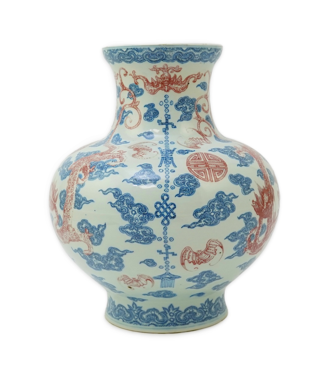 A Chinese underglaze blue and copper red ‘dragon’ vase, Qianlong seal mark but early 20th century